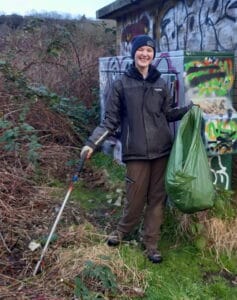 Heather Downer standing with litter picker