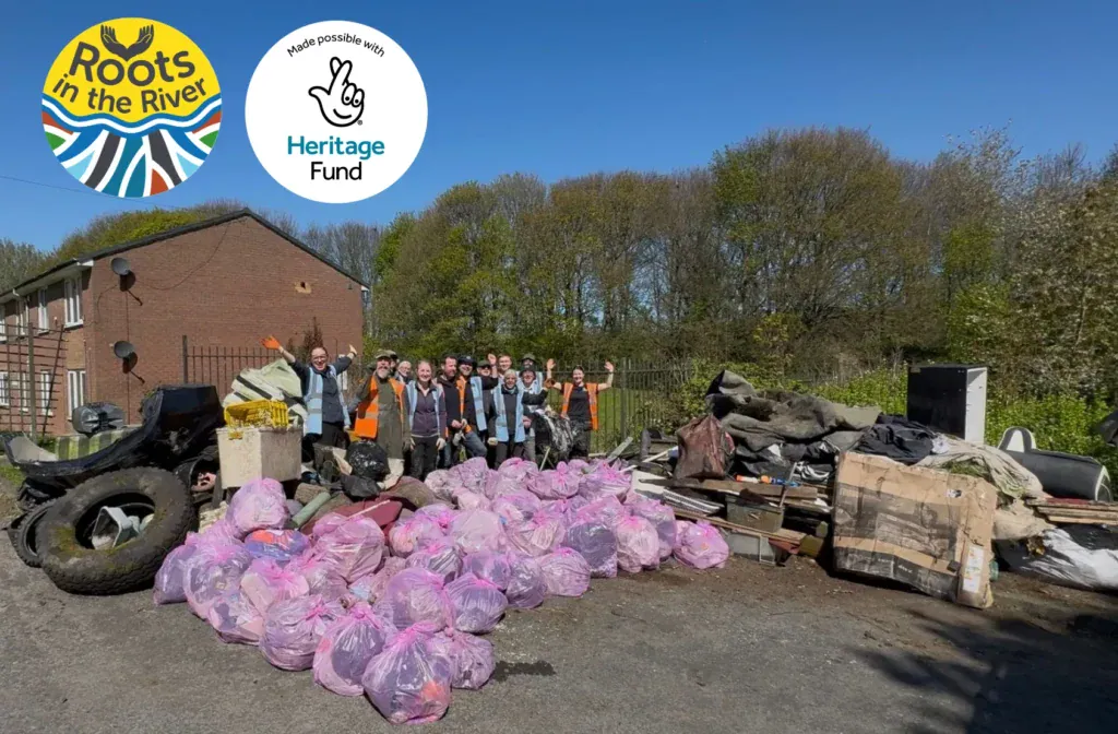 Community volunteers cleaning up litter at Aire Rivers Trust event.